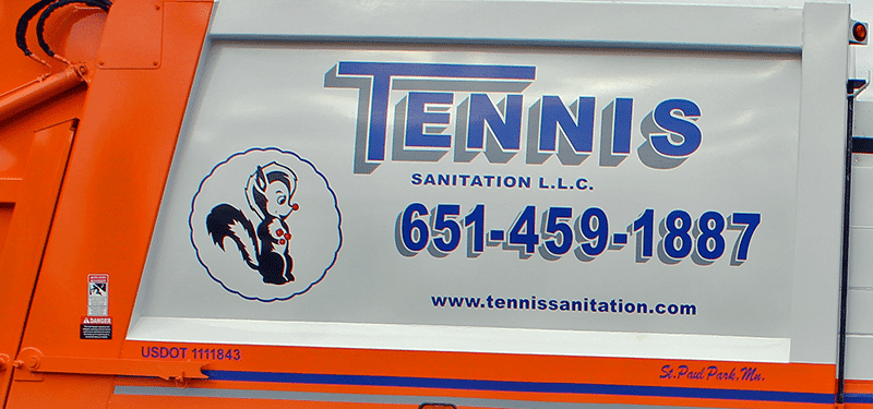 Tennis Sanitation truck showing logo and contact info for affordable trash pickup