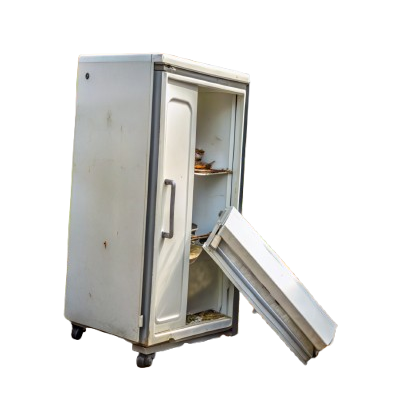 Old refrigerator placed at the curb for appliance pickup by Tennis Sanitation.